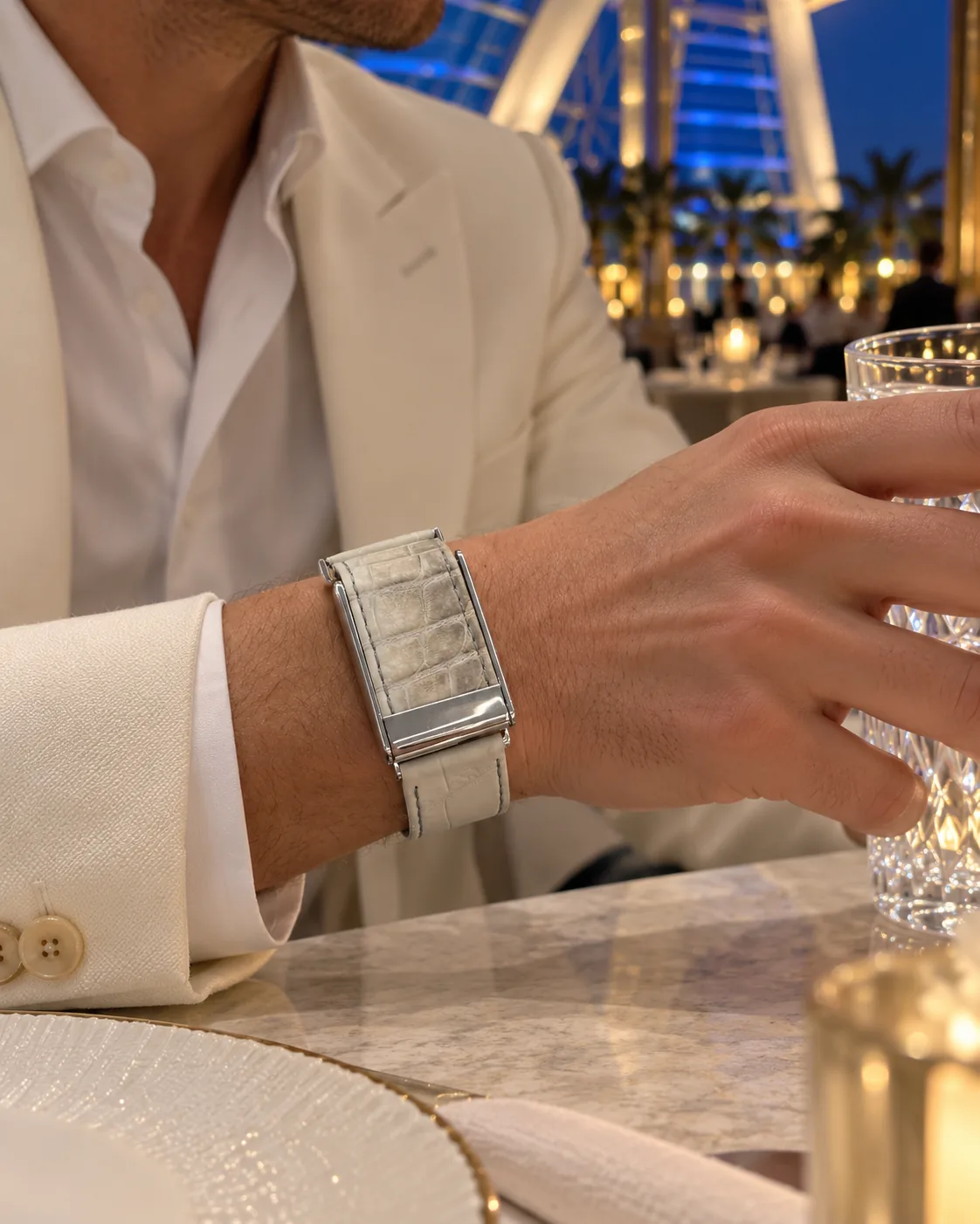 Himalayan WHOOP strap worn with a white dinner jacket in the evening